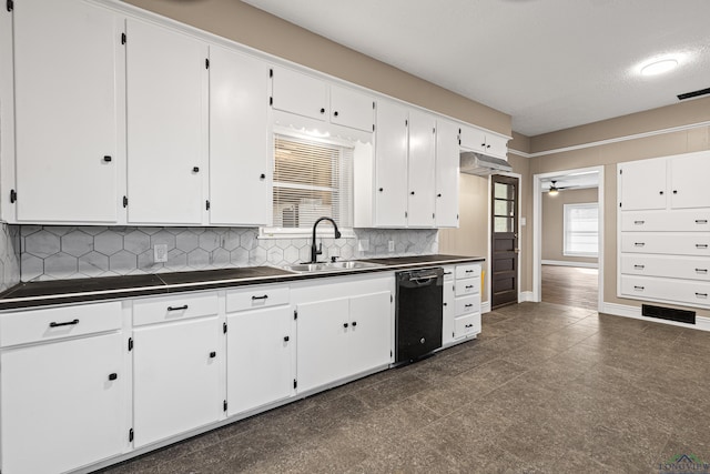 kitchen with white cabinetry, ceiling fan, decorative backsplash, dishwasher, and sink