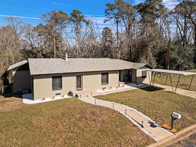 ranch-style home with a front lawn and a carport