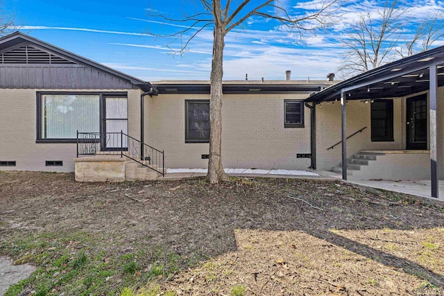 back of house featuring a patio area