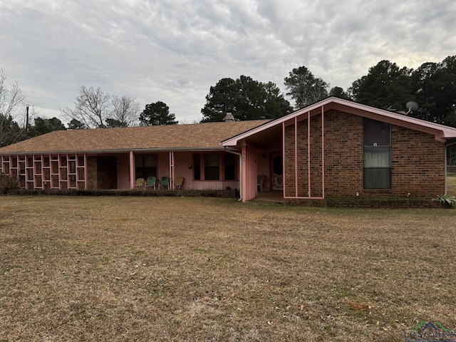 view of front of home with a front yard