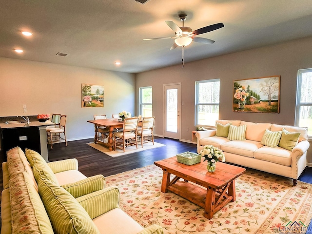 4020 Gregg Tex Rd, Longview, TX 75604 - living room with dark wood finished floors, ceiling fan, recessed lighting, and baseboards