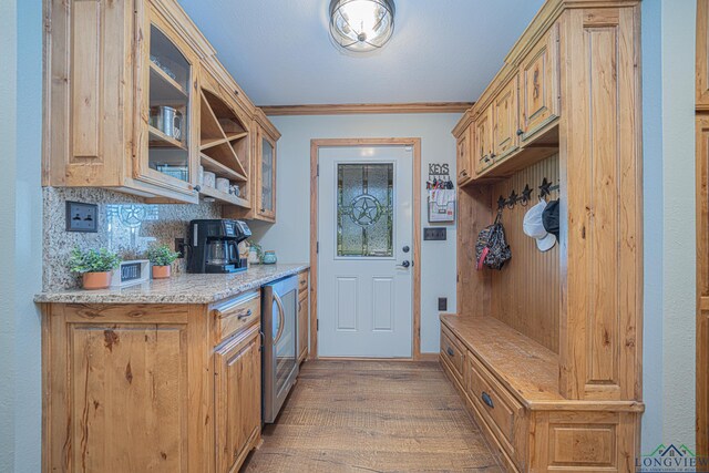 322 Roy Green Rd, Longview, TX 75602 - mudroom with wood finished floors and ornamental molding