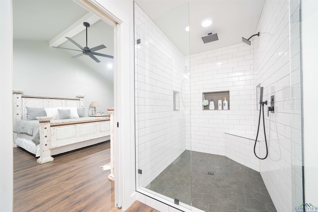 322 Roy Green Rd, Longview, TX 75602 - ensuite bathroom with a stall shower, a ceiling fan, and wood finished floors