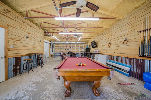 322 Roy Green Rd, Longview, TX 75602 - game room featuring wooden walls, concrete flooring, pool table, a ceiling fan, and a garage