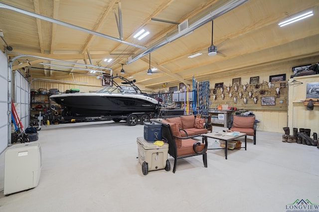 322 Roy Green Rd, Longview, TX 75602 - garage featuring a garage door opener