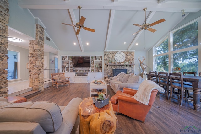 322 Roy Green Rd, Longview, TX 75602 - living room featuring a ceiling fan, a fireplace, wood finished floors, high vaulted ceiling, and beamed ceiling