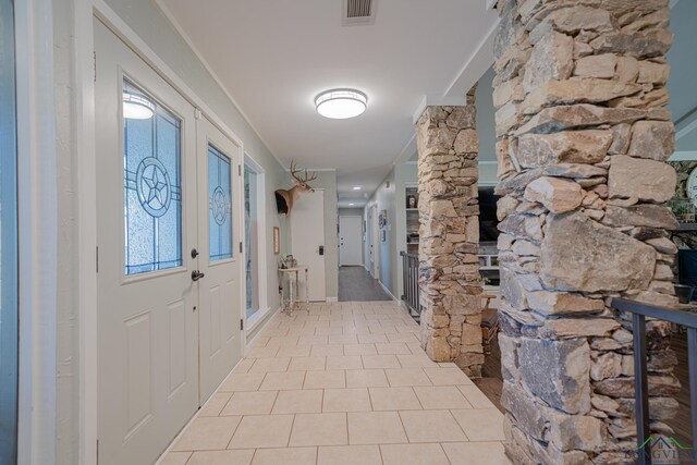 322 Roy Green Rd, Longview, TX 75602 - entryway with light tile patterned flooring and decorative columns