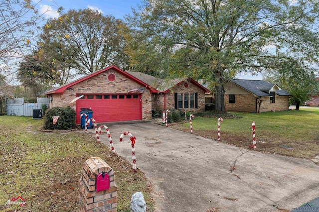 ranch-style house with a garage, central AC, and a front lawn