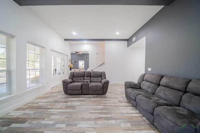 living room featuring ceiling fan, baseboards, wood finished floors, and recessed lighting