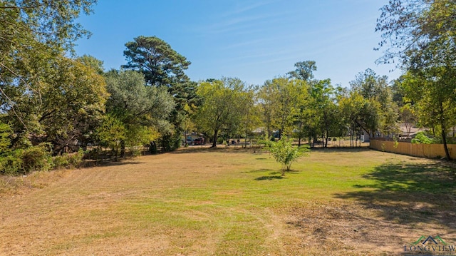 view of yard with fence