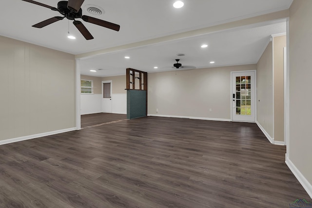 unfurnished living room with dark hardwood / wood-style floors and ceiling fan