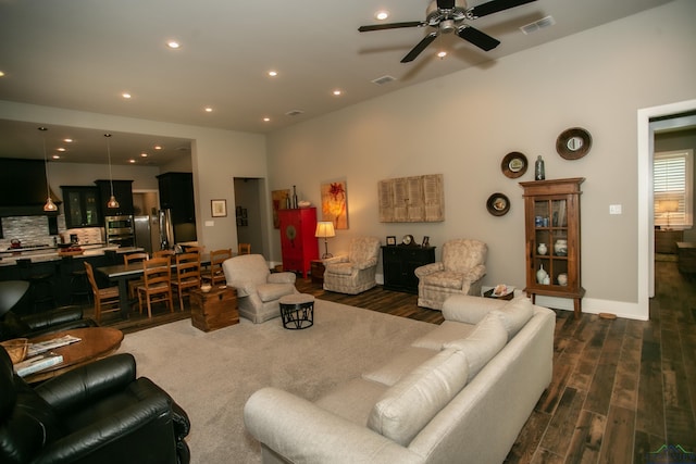 living room featuring visible vents, recessed lighting, ceiling fan, and dark wood-type flooring