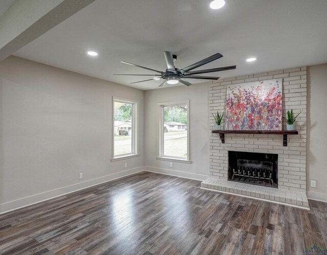 3902 Hazel St, Texarkana, TX 75503 - unfurnished living room with ceiling fan, wood finished floors, baseboards, a brick fireplace, and recessed lighting