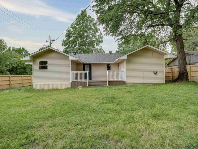 3902 Hazel St, Texarkana, TX 75503 - back of house with a wooden deck