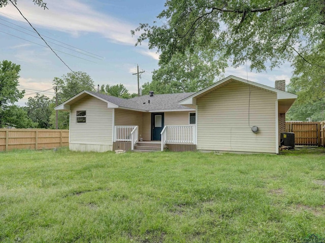 3902 Hazel St, Texarkana, TX 75503 - back of house featuring a chimney