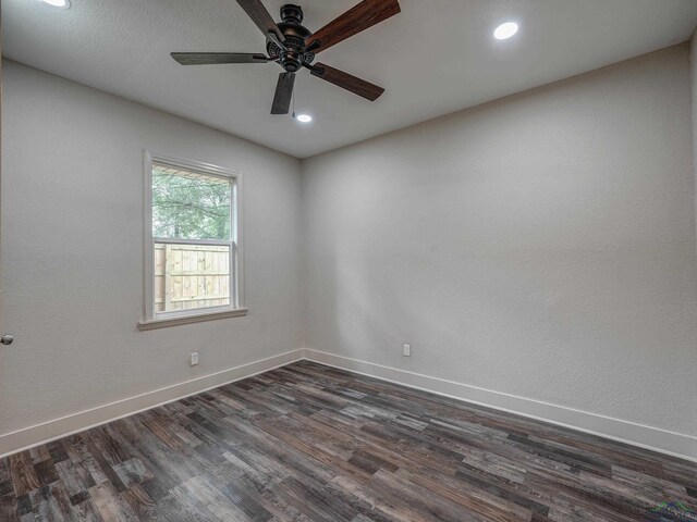 3902 Hazel St, Texarkana, TX 75503 - spare room featuring dark wood finished floors, baseboards, ceiling fan, and recessed lighting