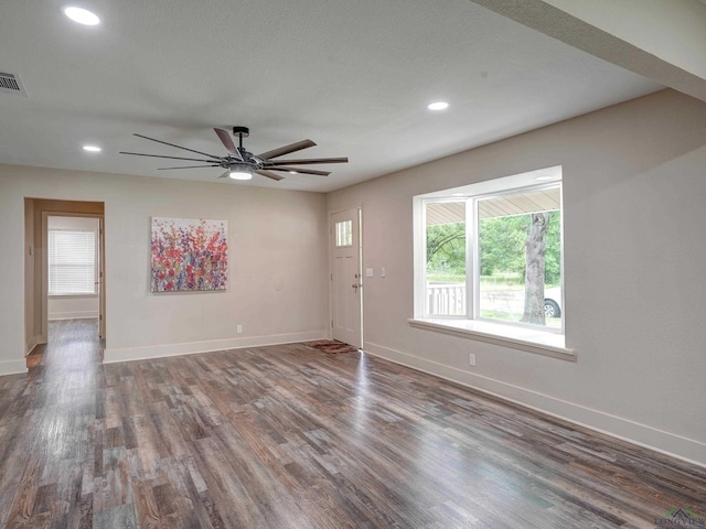 3902 Hazel St, Texarkana, TX 75503 - unfurnished living room with ceiling fan, wood finished floors, baseboards, and recessed lighting