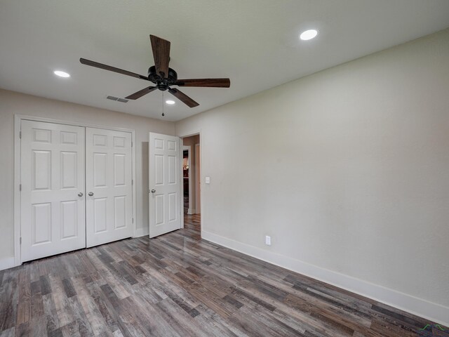 3902 Hazel St, Texarkana, TX 75503 - unfurnished bedroom with baseboards, recessed lighting, dark wood-type flooring, a closet, and ceiling fan