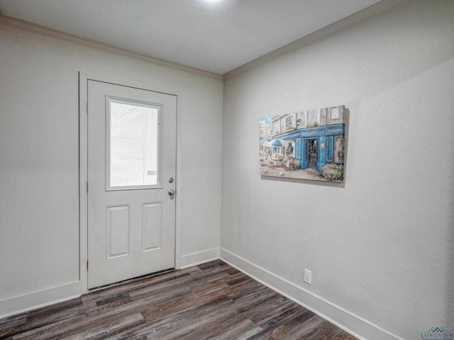 3902 Hazel St, Texarkana, TX 75503 - doorway featuring crown molding, dark wood-style flooring, and baseboards