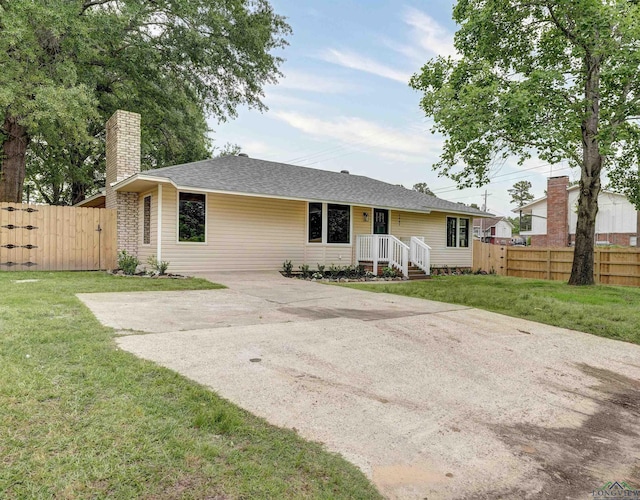 3902 Hazel St, Texarkana, TX 75503 - single story home with a chimney, a gate, driveway, and a shingled roof