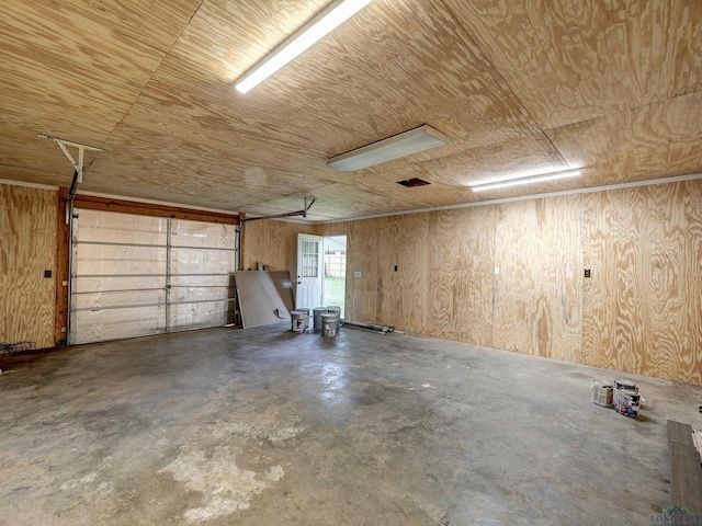 3902 Hazel St, Texarkana, TX 75503 - garage featuring wooden ceiling and wooden walls