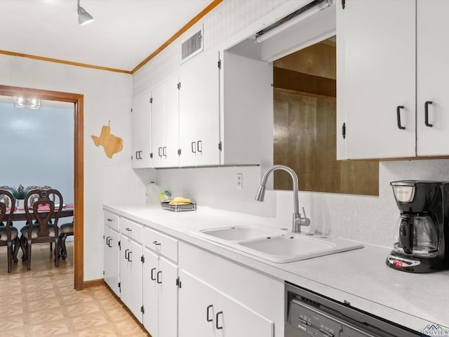 kitchen featuring dishwasher, white cabinetry, ornamental molding, and sink