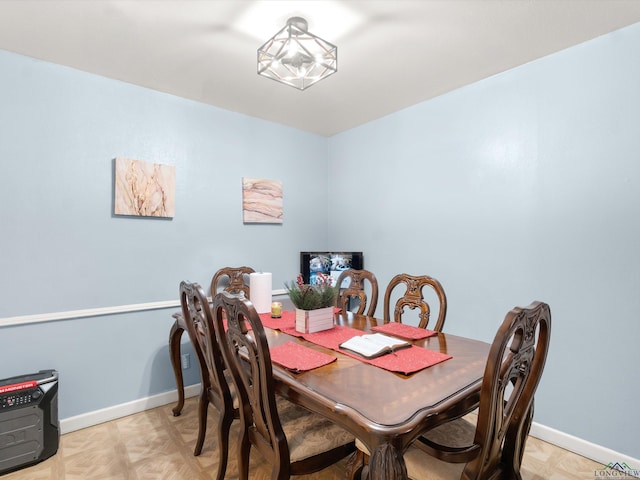 dining area with light parquet flooring