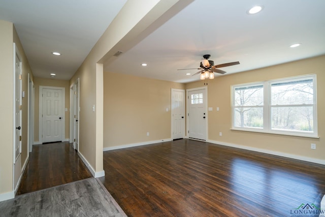 foyer with dark wood-type flooring and ceiling fan