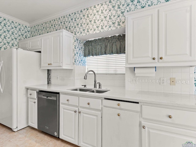 kitchen featuring white cabinets, light tile patterned flooring, stainless steel dishwasher, and sink