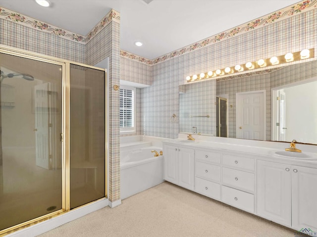 bathroom featuring vanity and plus walk in shower