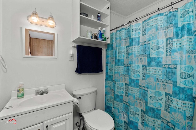 bathroom featuring ornamental molding, a textured ceiling, toilet, vanity, and a shower with shower curtain