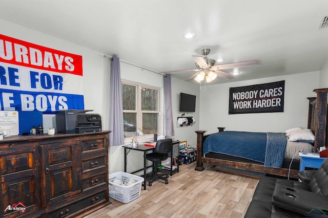 bedroom featuring ceiling fan and light wood-type flooring