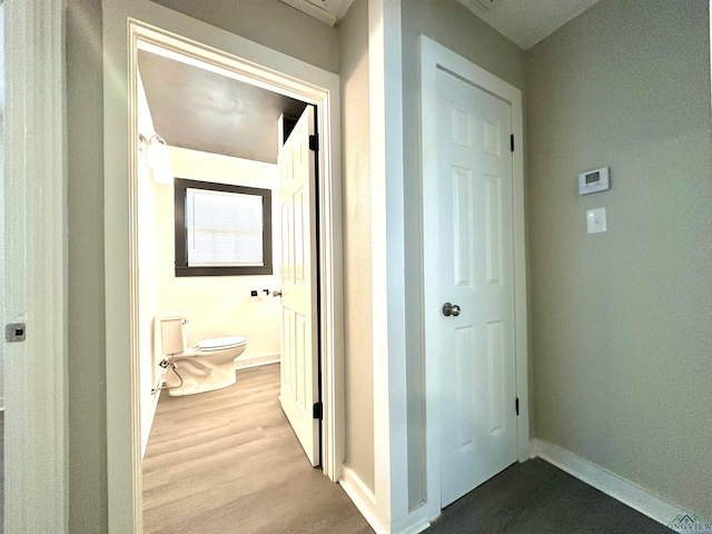 1407 E US-80, White Oak, TX 75693 - hallway featuring wood finished floors and baseboards