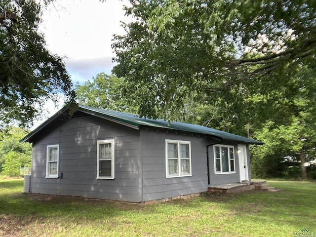 1407 E US-80, White Oak, TX 75693 - view of side of property featuring a lawn