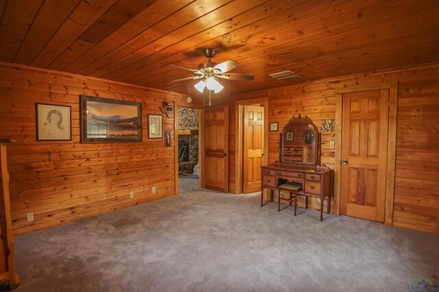 325 Laurel Ln, Holly Lake Ranch, TX 75765 - living area featuring wood walls, carpet floors, wood ceiling, and ceiling fan