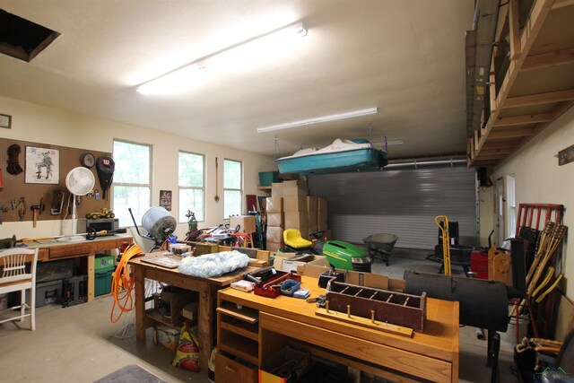 325 Laurel Ln, Holly Lake Ranch, TX 75765 - garage with a workshop area