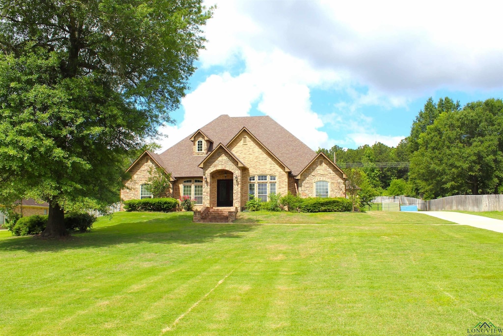 200 Oakland Dr, Longview, TX 75605 - french country inspired facade with stone siding and brick siding