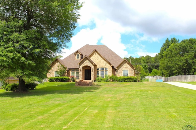 200 Oakland Dr, Longview, TX 75605 - french country inspired facade with stone siding and brick siding