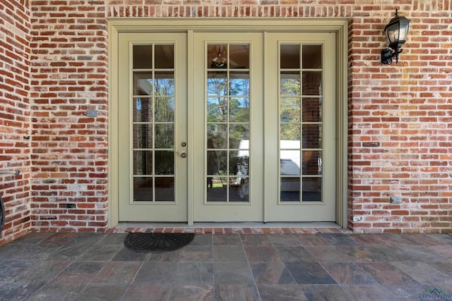 property entrance featuring french doors