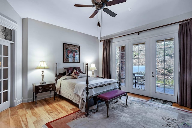 bedroom featuring access to outside, ceiling fan, french doors, and vaulted ceiling