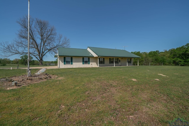 620 County Road 3332, Omaha, TX 75571 - view of front of house with a front yard