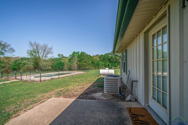 620 County Road 3332, Omaha, TX 75571 - view of yard featuring a fenced in pool, a patio, central AC, and fence
