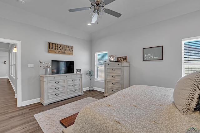 bedroom featuring recessed lighting, ceiling fan, baseboards, and wood finished floors