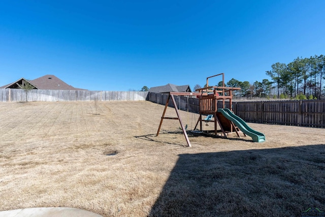 view of play area featuring a fenced backyard