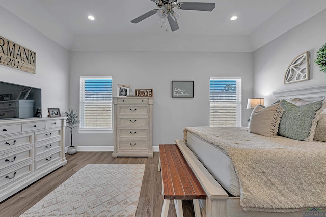 bedroom with a ceiling fan, baseboards, dark wood-style flooring, and recessed lighting