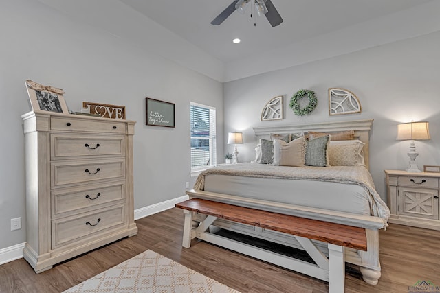 bedroom with a ceiling fan, recessed lighting, baseboards, and wood finished floors