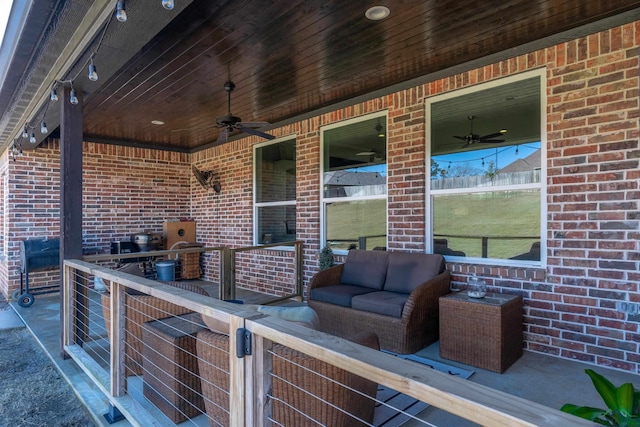 view of patio with ceiling fan and an outdoor hangout area