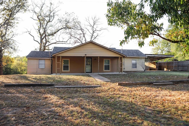 single story home with a carport