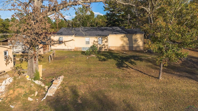 exterior space with a yard