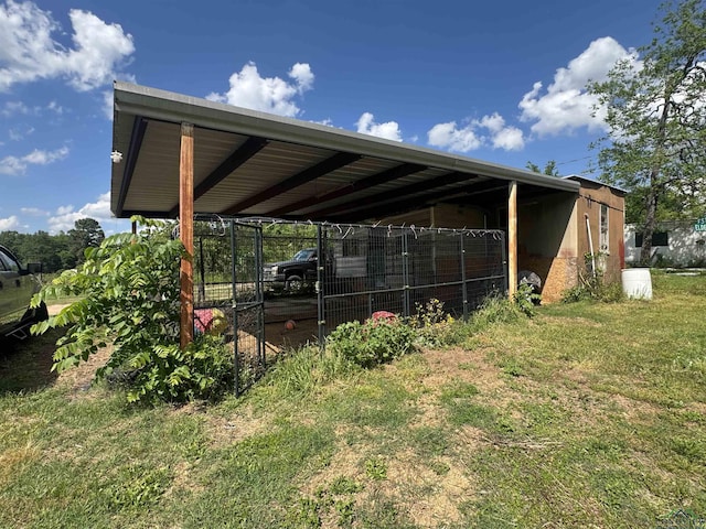 view of parking / parking lot with a carport